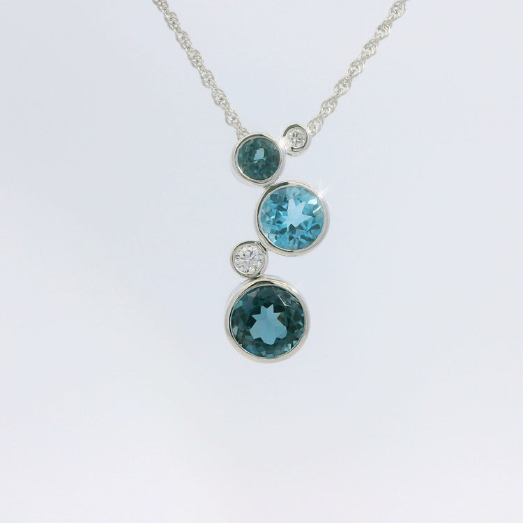 Round Bezel Set Blue Topaz and Diamond Pendant