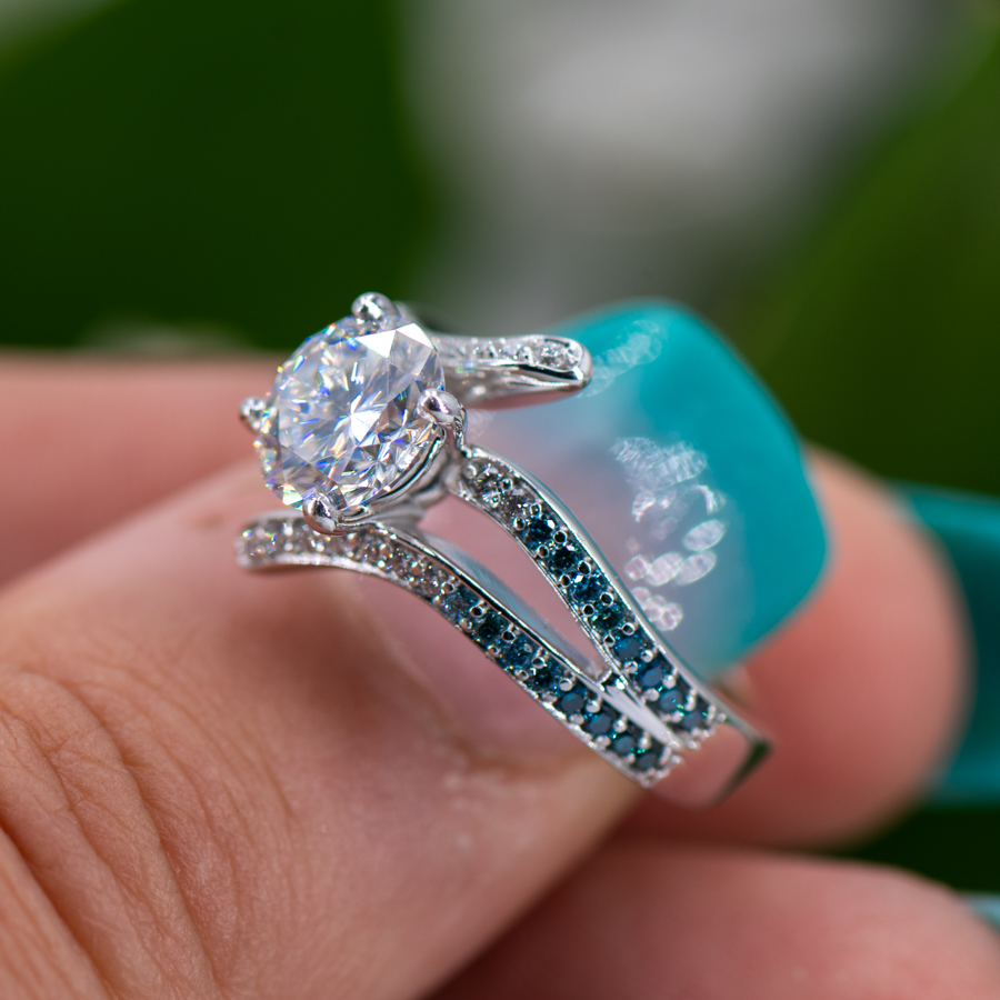 blue ombre ocean inspired engagement ring in white gold with big moissanite center stone